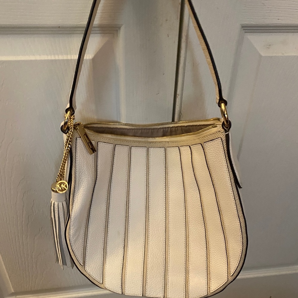 White Michael Kors Crossbody bag.
